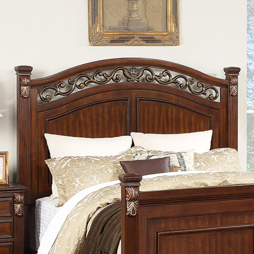 Bed With Ornate Carvings And Curved Headboard