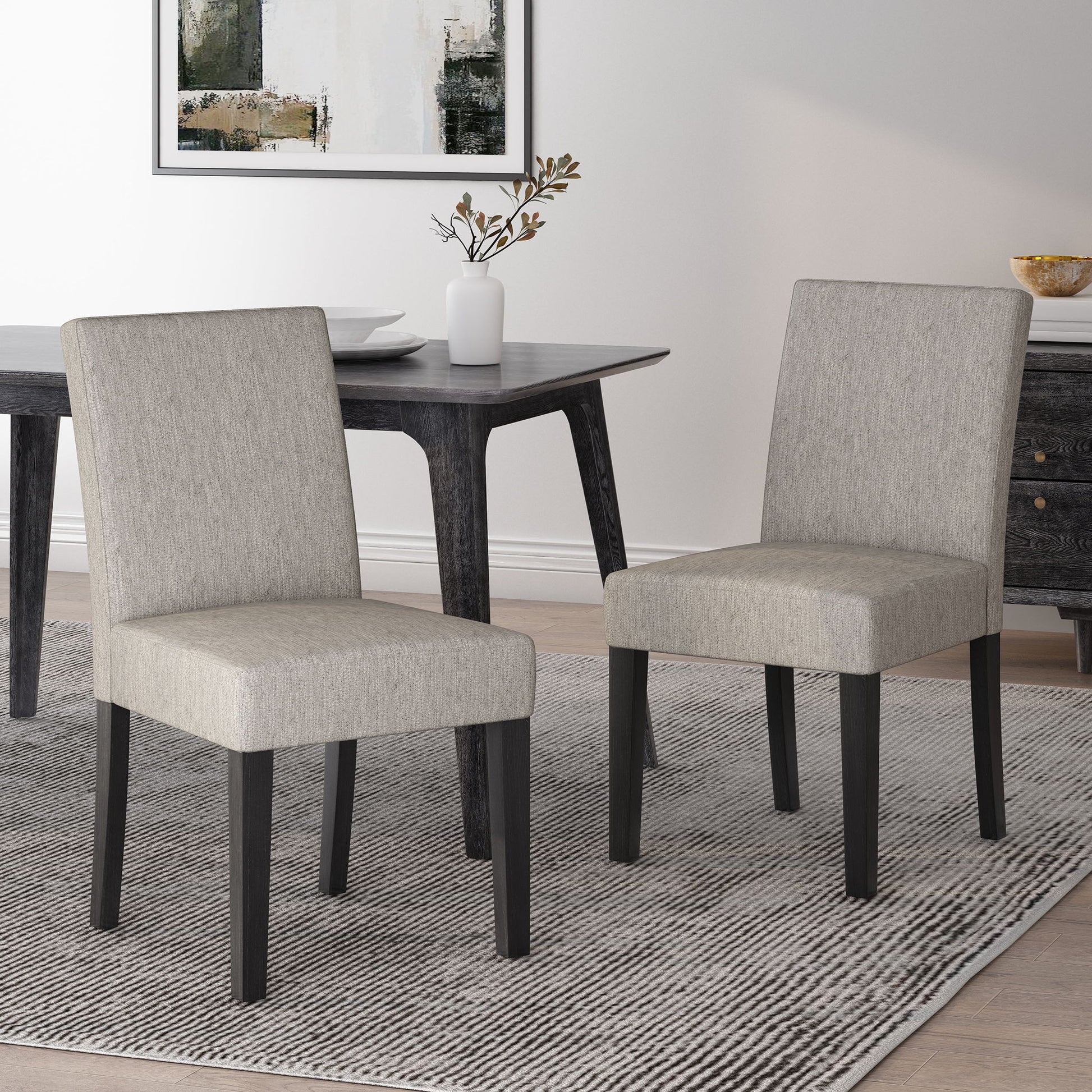 Contemporary Dining Chair With Upholstered Seating And Tapered Legs