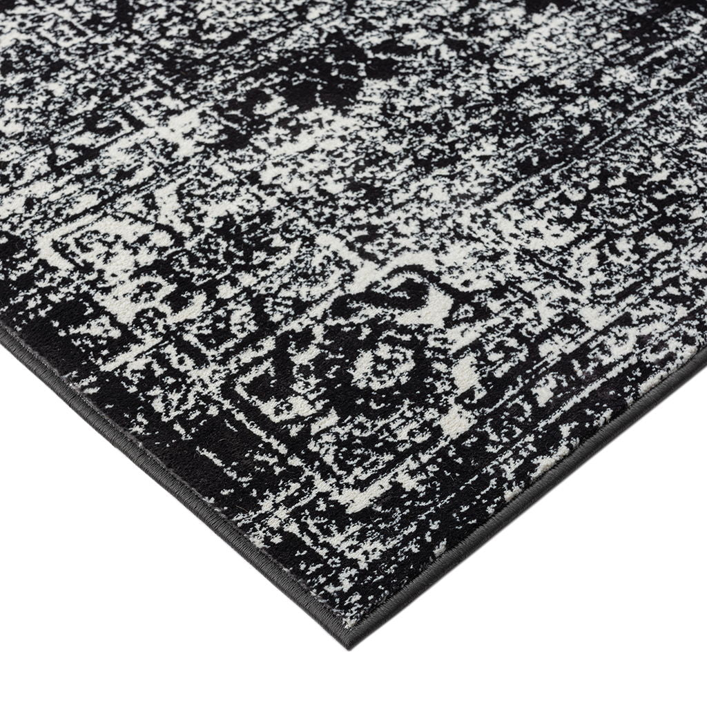 Chadwick - 8' x 10' Distressed Vintage Persian Woven Area Rug - Black / Cream